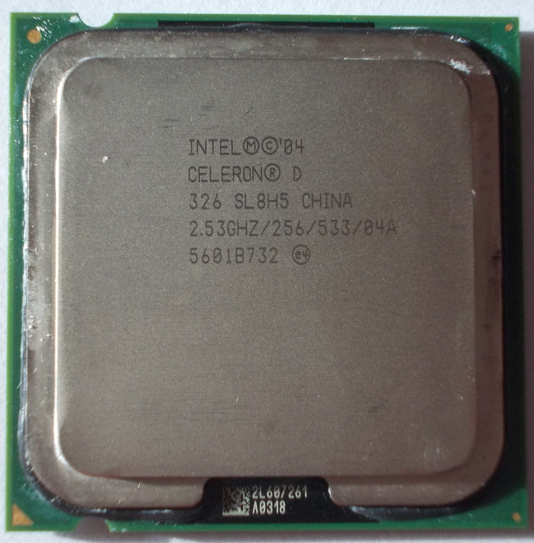 Интел селерон характеристики. Intel 04 Celeron d 326 sl98u. Intel Celeron d 2.8 GHZ 256 533 04a. Процессор Интел 86 Celeron. Celeron d 326 2.53GHZ характеристики.